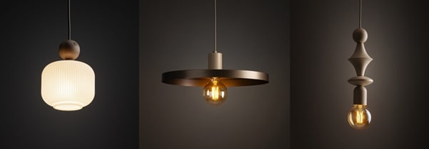 A trio of different pendant light styles, including glass, metal, and sculptural designs.